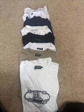 Bundle of 8 t-shirts size L short sleeve assorted colors. Good condition.